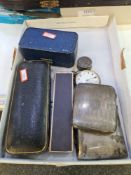 Two silver cigarette cases having striped detailing on the body and gilted interior. Also with a sil