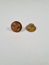 Pair of 18ct dress studs, circular form and decorative panels, marked 18K, approx 6.62g