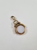 9ct gold mounted fob spinning pendant, circular form set agate with clip on clasp marked 375, approx