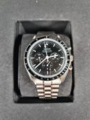 OMEGA; An as new Omega Speedmaster Professional Chronograph Moonwatch, Stainless Steel, with black d