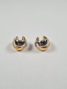 Pair of 18ct two tone crossover design hoop earrings, marked 750, 4.19g approx