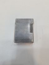 A vintage Dupont silver plated cigarette lighter