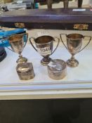 A small lot comprising a pair of miniatures silver trophy cups by Cornelius Desormeaux Sanders and J