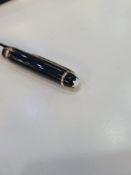 Mont Blanc; a black and gilt fountain pen