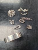 Selection of silver jewellery including bangle, brooches, etc
