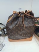 Louis Vuitton; A lovely aged Louis Vuitton Noe Monogram handbag. Monogram coated canvas bag with nat