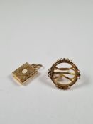 14ct yellow gold earring, AF, marked 585, approx 4.73g and a charm in the form of a bible, marked 75