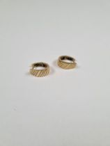 Pair of 9ct gold huggie earrings, marked 375, London import marks, maker LAM, 3.65g approx