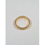 22ct yellow gold wedding band with all over diamond texture, marked 22, size K, 2.84g approx, BW & S