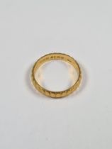 22ct yellow gold wedding band with all over diamond texture, marked 22, size K, 2.84g approx, BW & S