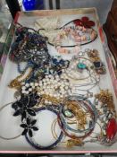 Tray of vintage and modern costume jewellery including silver chains, cloisonné bangles, bead neckla