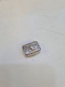 A pretty silver Georgian Vinaigrette having embossed flower on the lid in relief. Decorative engrave