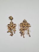 Antique unmarked yellow gold pendant brooch of floral design, set with seed pearls, three suspending