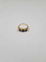 18ct yellow gold dress ring set three oval faceted sapphires each separated with two small diamond c