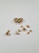 Two pairs of 9ct yellow gold ball stud earrings, 9ct tri gold hoops and another pair 9ct earrings, a