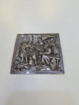 A silver Dutch plaque depicting Het Sint Nicolaas Feest in embossed design in relief, Decorative des