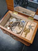 Small jewellery box containing silver bangle, silver chains, lockets, amber and silver bracelet, etc