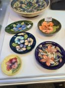 Five Moorcroft small dishes and similar (two damaged)