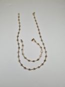 14ct yellow and white gold necklace with Greek key design marked 585, 44cm, and matching bracelet, 1
