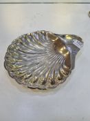 A very large silver shell dish having three ball feet. A decorative piece by Atkin Brothers, Sheffie