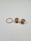 Pair of 9ct yellow gold clip on earrings, with circular panels depicting Chinese characters, 9ct gol