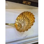 A superb George III Old English pattern silver-gilt soup ladle. Fully silver gilt, in quality colour