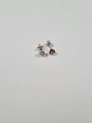 Pair of 9ct white gold diamond stud earrings, each approx 0.08ct marked 375, with butterfly backs