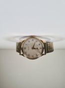 9ct gold cased Helvetia watch with champagne numbered dial, subsidiary seconds dial, winds and ticks