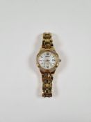 Seiko; ladies Seiko dress watch, solar with Mother of Pearl dial, baton and Roman numerals, date ape