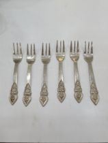 A set of six small forks having embossed, decorative handle. Stamped Thailand Silver. 2.76ozt approx