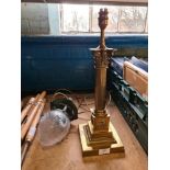 A brass Corinthian column table lamp and an Art Nouveau ceiling light with glass bowl