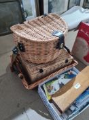 A wicker picnic basket, a quantity of post 1950 postcards and sundry