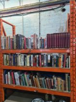A quantity of Military related books on 2 shelves and 3 other shelves of books