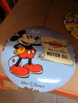 A modern enamelled sign for Sunoco with figure Micky Mouse, 30cm