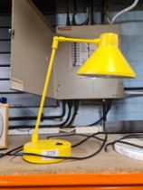 An anglepoise lamp and one other desk lamp
