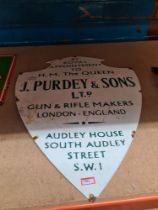 A modern shield shape enamel sign for J Purdy gun and rifle makers, 39cm