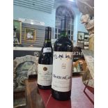 One bottle of Baron Philippe de Rothschild 1997 Mouton Cadet red Bordeaux and one Andre Roux 2000 Co