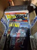 A small quantity of mini World magazines and 2 pictures