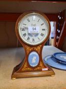A Comitti Edwardian style mantle clock with Wedgwood Jasperware plaque and 3 Wedgwood plates
