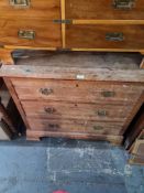 An early 20th Century chest having 3 long drawers and a similar writing table having 2 drawers