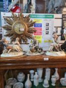 Three Capodimonte figures and one other of Laurel & Hardy