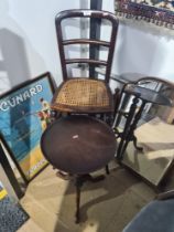 A selection of furniture including cane seated chair, wine table, and a bevelled edge dressing table