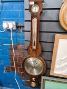 A Georgian mahogany banjo barometer by Bell & Son Uttoxeter