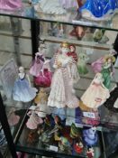 11 Coalport figures including a limited edition of Empress Josephine and one Royal Doulton figure