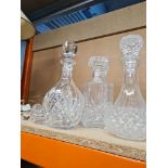 A quantity of decanters and similar