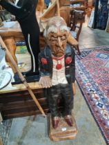 A modern carved wooden figure of Butler on square base, 103cm