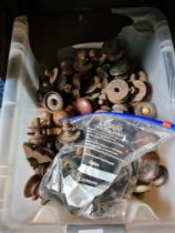 A box of wooden knobs and similar