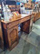 A Victorian mahogany pedestal sideboard having three frieze drawers with shaped back, 152cms