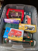 Two boxes of modern die cast vehicles, including Corgi examples