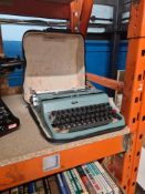 A vintage Underwood typewriter and one Olivetti example